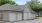 a garage with white doors