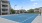 a tennis court with a fence