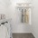 a closet with white clothes