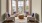 a room with a large window and chairs