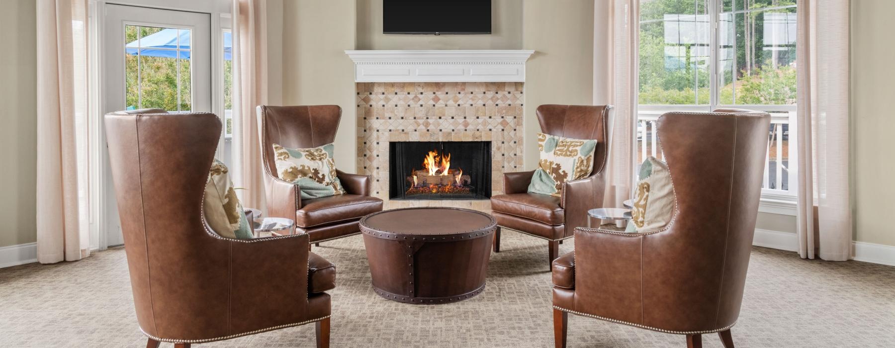 a living room with a fireplace