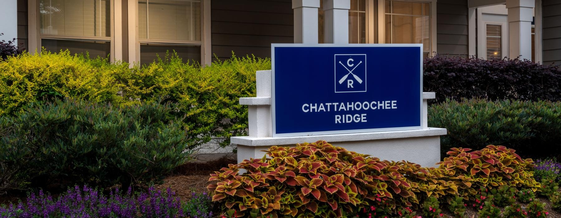 a sign in front of a house